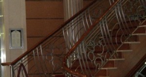 Branding and logos can be incorporated into other elements without interfering with their core purpose. These stair rails are very Disney without actually using a name or logo.